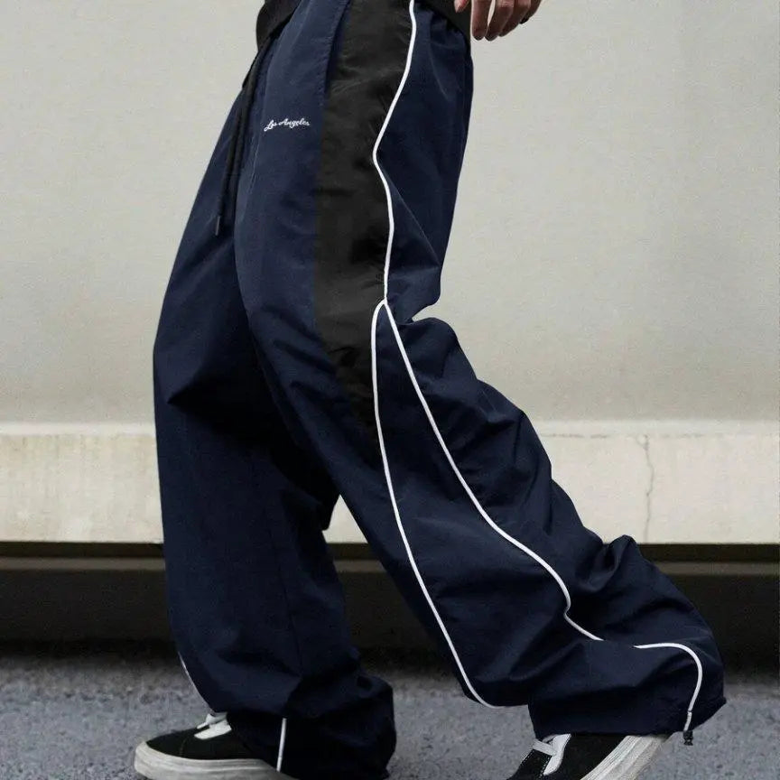 Pantalones calle Shadow Line Street de THE LJM en color oscuro, con diseño ajustado y estilo urbano para hombres.