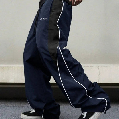 Pantalones calle Shadow Line Street de THE LJM en color oscuro, con diseño ajustado y estilo urbano para hombres.