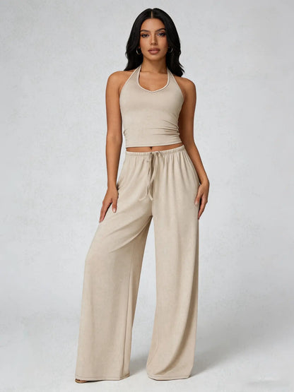 Conjunto Bella Relax de THE LJM en tonos suaves, incluye pantalones y blusa cómodos para descanso y estilo casual.