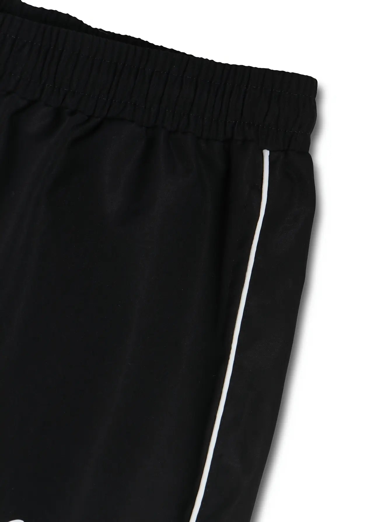 Pantalones deportivos Shadow Line Street de THE LJM en color oscuro, con diseño moderno y detalles ajustados en la parte superior