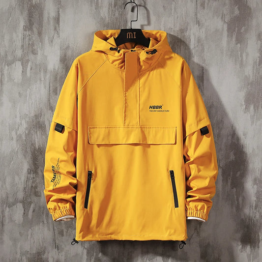 Chaqueta anorak Flash de THE LJM en color brillante, con capucha y bolsillos, diseñada para protección contra la lluvia