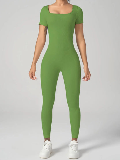 Mono deportivo de manga larga para mujer THE LJM en punto ribbed sólido, con control de abdomen y ajuste cómodo.