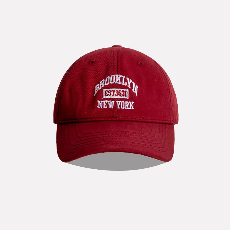 Gorra Brooklyn Classic de THE LJM en color gris, con diseño clásico y visera curva, vista frontal en imagen.