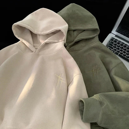 Sudadera Essential Comfort Hoodie de THE LJM en color gris, con capucha y bolsillos delanteros, vista frontal del producto.