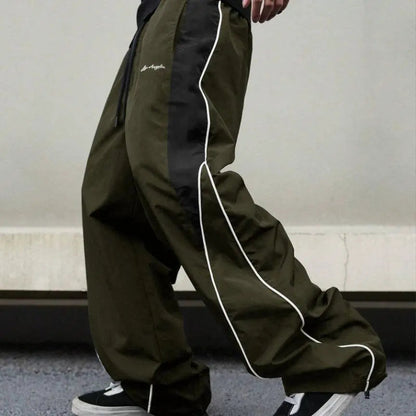 Pantalones calle Shadow Line Street de THE LJM en color negro, con diseño ajustado y cinturilla elástica.